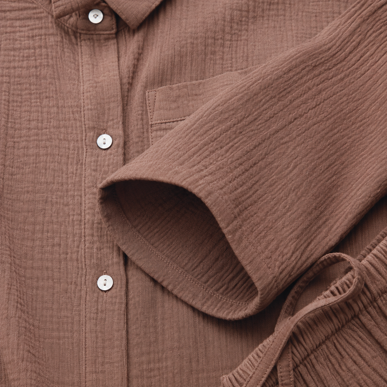 Mauve cotton muslin shirt sleeve and cuff detail