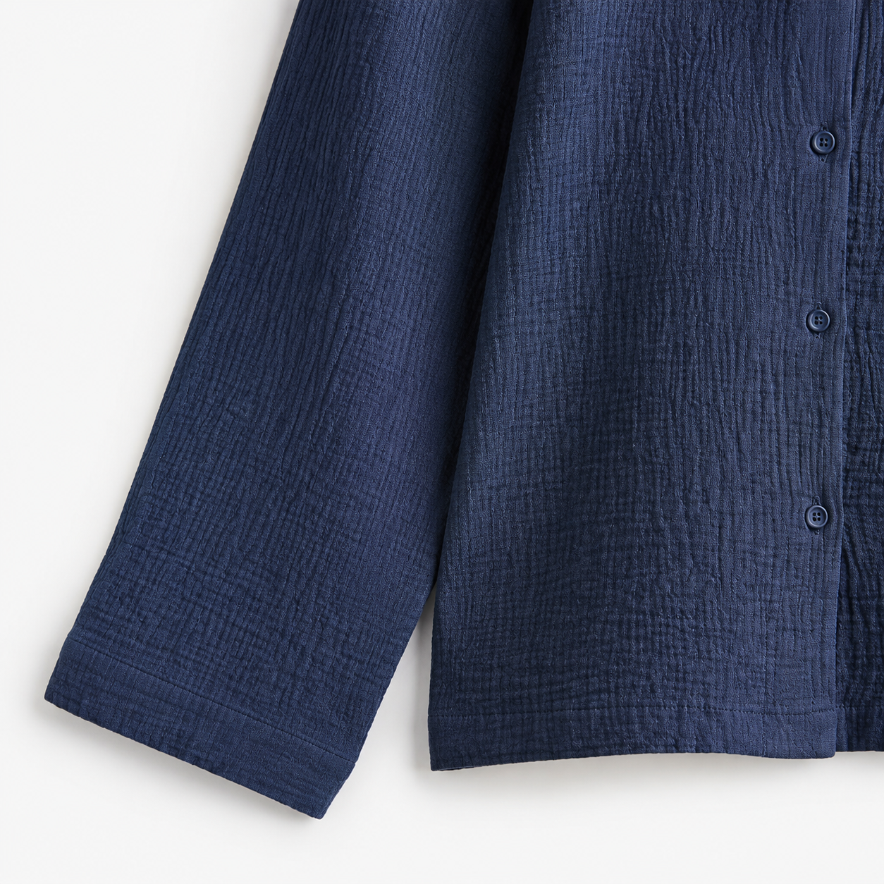 Navy organic cotton muslin pajama set sleeve closure detail