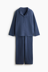 Navy organic cotton muslin pajama set on white background