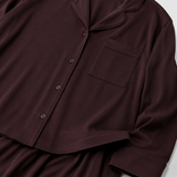 Deep burgundy pajama set fabric and pocket detailing