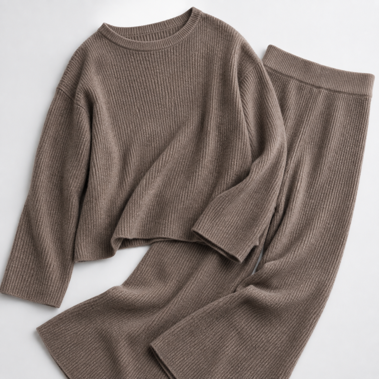 Taupe woolen knitted fabric texture and lounge-set construction detail